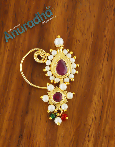 Explore the collection Maharashtrian Nath Design and Banu Nath Design at best price by Anuradha Art Jewellery. To see more designs click on the given link: http://www.anuradhaartjewellery.com/artificial-jewellery/maharashtrian-jewellery/nath/66