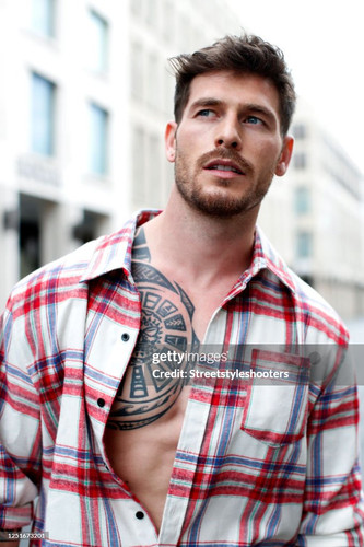 BERLIN, GERMANY - JUNE 19: Influencer, model and actor Angelo Carlucci, wearing light blue acid wash.jpg