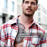 BERLIN, GERMANY - JUNE 19: Influencer, model and actor Angelo Carlucci, wearing light blue acid wash