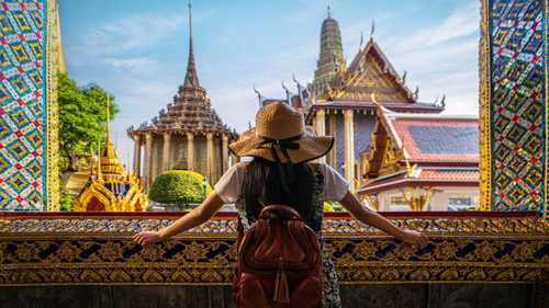 Asian woman traveller take a photo and travel in Bangkok grand palace and wat phra kaew in Bangkok c.jpg