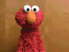 Shrugs 11 Elmo shrugging aka Unbothered I Don't Care Oh Well Whatever Who Cares (Animated GIF).gif