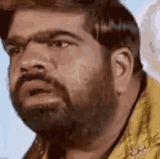 Confused 15 Cromagnon, caveman looking Indian guy looking around like he doesn't know where's he's a.gif