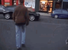 Epic Fail 18 Guy get's hit and knocked down by a bus while crossing the street aka Distraction Attac.gif