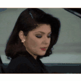 Ignoring 02 Generically pretty latina woman rolls up her car window in a very funny way aka GTFOH I'.gif