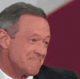 Gloating 02 White politician male snapping his head and smiling as if to gloat that he was right aka.gif