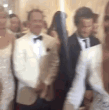 Showing Off 01 Puff Daddy flossing at some Black tie event aka Distraction Hate Me Jealousy Puffy Di.gif
