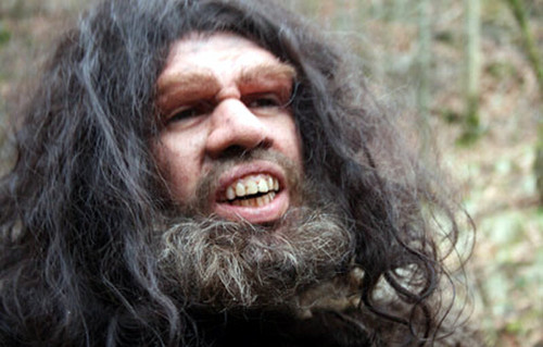 Confused 11 GEICO's caveman actor in costume looking hella confused aka Duhhh Huh Say What.jpg