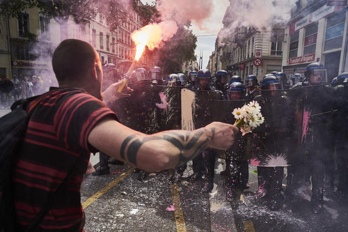 French Man Holding Flowers.jpg