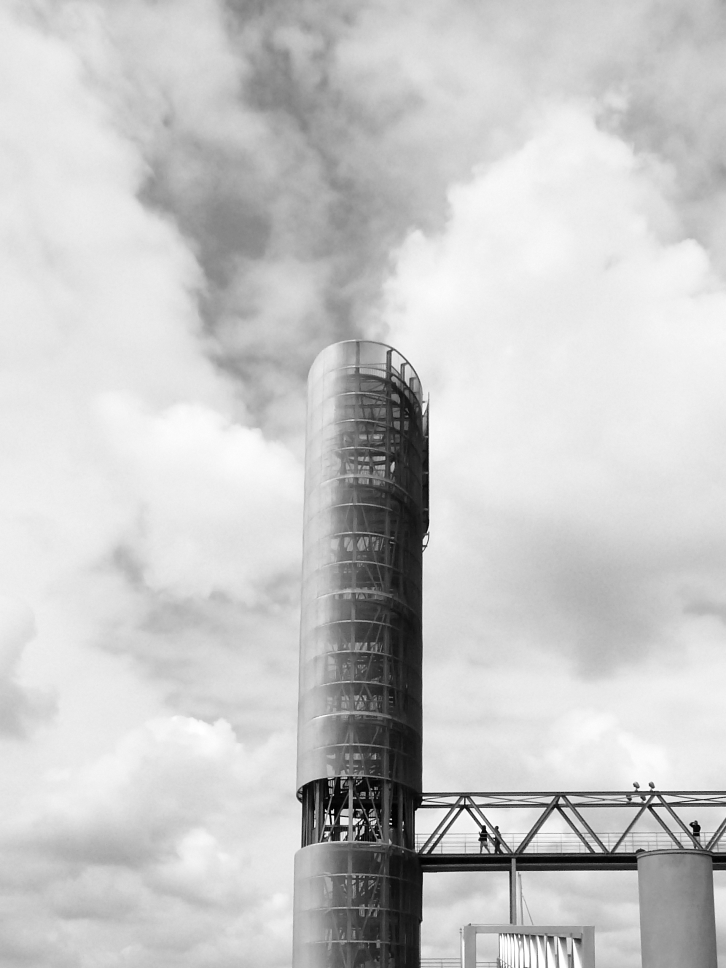 low angle view smoke stack against sky