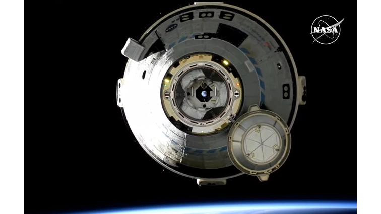 None Still image from the live stream of Starliner’s autonomous undocking showing the spacecraft as it slowly separated from the ISS.