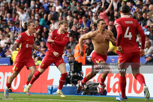 Liverpool's English defender #66 Trent Alexander-Arnold (2R) celebrates after scoring the opening go.jpg
