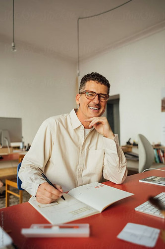  Man Posing In Office by Stocksy Contributor Studio Firma .jpg