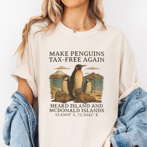 101. Mockup t shirt MK 1Mockup 2Penguins Against Tariffs 3 Black.jpg