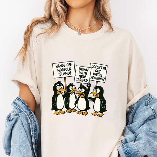 101. Mockup t shirt MK 1Mockup 2Penguins Against Tariffs 5.jpg