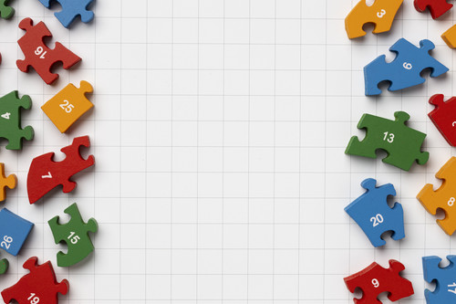 top view puzzle pieces with copy space education day.jpg