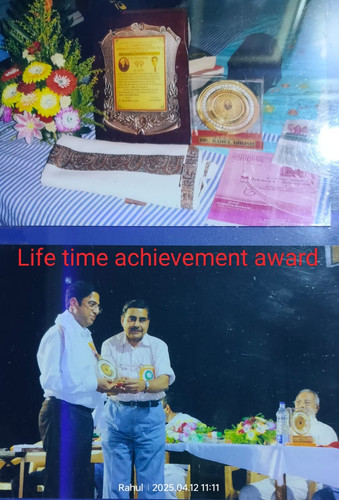 Dr. Rahul Ghosh receiving Lifetime Achievement Award 2014