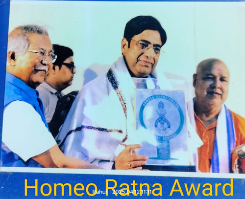 Dr. Rahul Ghosh receiving Homeo Ratna Honor 2016