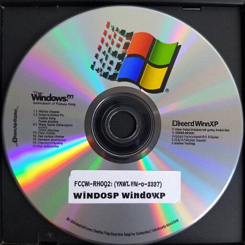 an unofficial copy of WinXP on a CD with a license key FCKGW RHQQ2 YXRKT 8TG6W 2B7Q8 on it .jpg