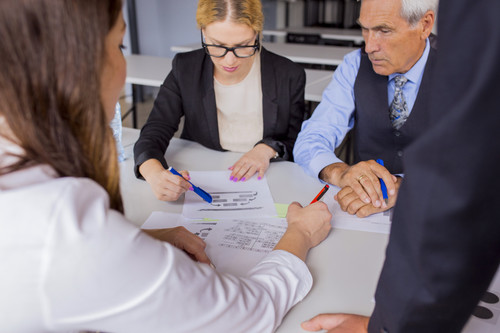 group business people discussing business plan table office.jpg