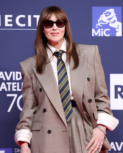 I’m so happy to see you!!!!New Monica Bellucci attends the photocall during the 70th David Di Donate.jpg