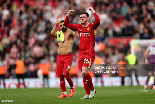 LIVERPOOL, ENGLAND - MARCH 08: Andrew Robertson of Liverpool celebrates victory after the Premier Le.jpg