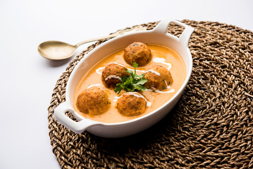 Malai Kofta Curry is a Mughlai special recipe served in a bowl. Selective focus.jpg