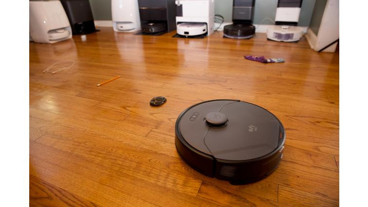 None A Eufy robot vac running the gauntlet in my test lab / sitting room.