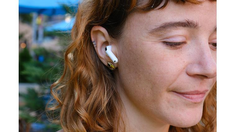 None A hands-on photo of Apple’s AirPods 4 wireless earbuds.
