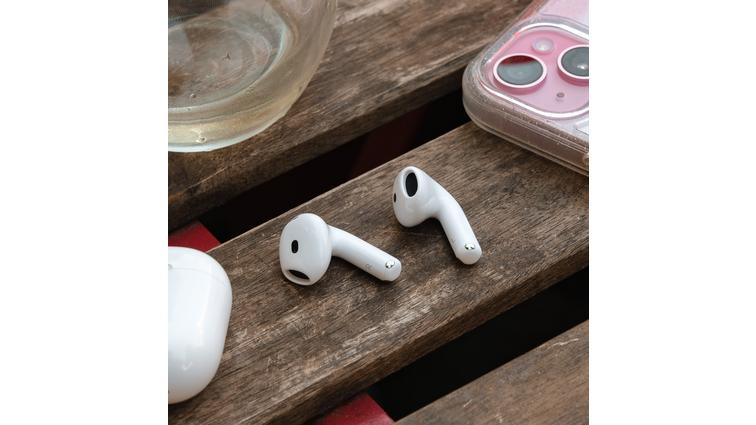 None A hands-on photo of Apple’s AirPods 4 wireless earbuds.