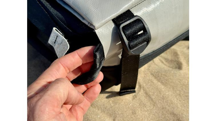 <em>The straps can be tucked out of the way in this integrated sleeve.</em>” title=”None” onclick=”openModal(this)”></div><div class=