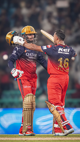 Lucknow: Royal Challengers Bengaluru's batters Jitesh Sharma and Mayank Agarwal celebrate after Beng.jpg