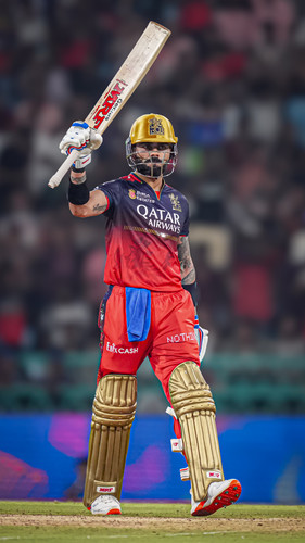 Lucknow: Royal Challengers Bengaluru's batter Virat Kohli celebrates his half century during the Ind.jpg