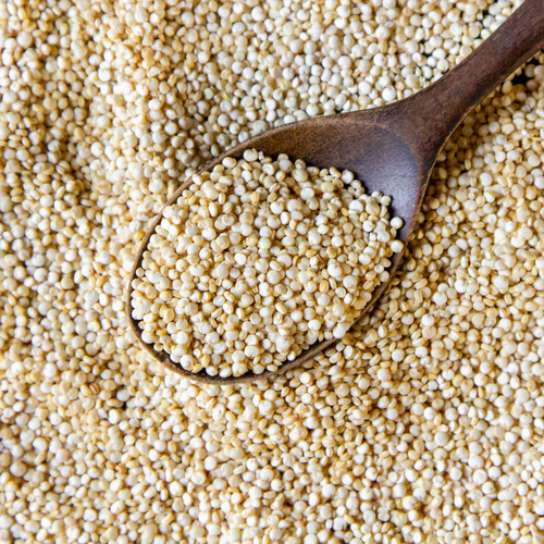 top view quinoa with a wooden spoon.jpg
