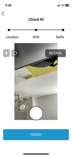The Retake caption and camera change button are displayed on the captured image.jpg