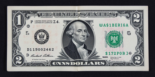 A clear detailed image of a United States 2 bill showing the front and back with all the details of .jpg