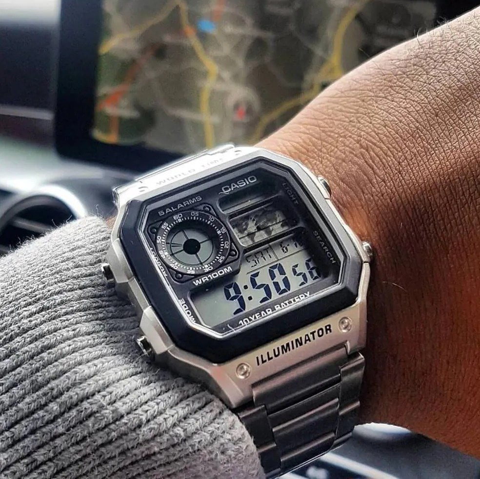 Relógio Casio AE-1200WHD-1 Masculino Word Time Prata Quadrado Cor da correia Prateado