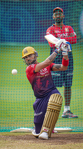 Bengaluru: Royal Challengers Bengaluru's Virat Kohli plays a shot during a practice session ahead of.jpg