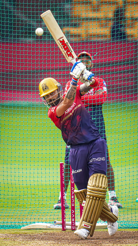 Bengaluru: Royal Challengers Bengaluru's Virat Kohli plays a shot during a practice session ahead of.jpg