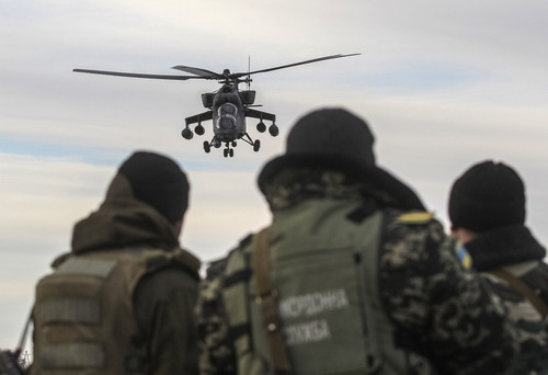 Troops and Helicopter
