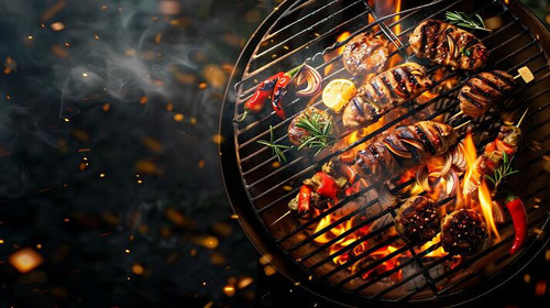 open flaming charcoal grill with various food items cooking on it showcasing a summer grilling barbe.jpg