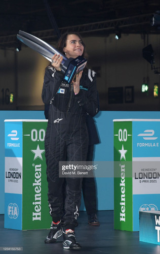 cara delevingne presents the winners trophy at the abb fia formula e picture id1234155753?s=2048x204.jpg