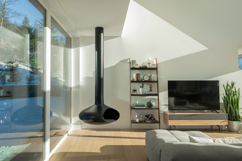 sugarloaf residence pemberton lower living room suspended fireplace forest view.jpg