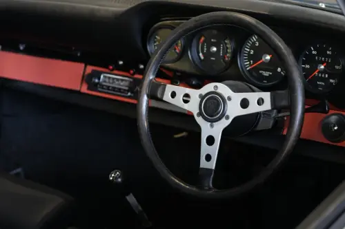 Porsche interior. Sony FE 70-200mm F4 Macro G OSS II sample photo. Copyright Joshua Waller.