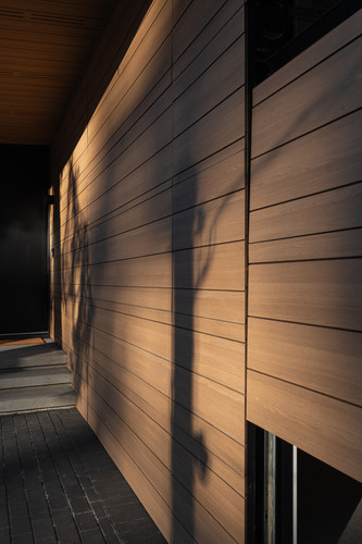 fitzsimmons residence whistler exterior entry corridor cedar wall.jpg