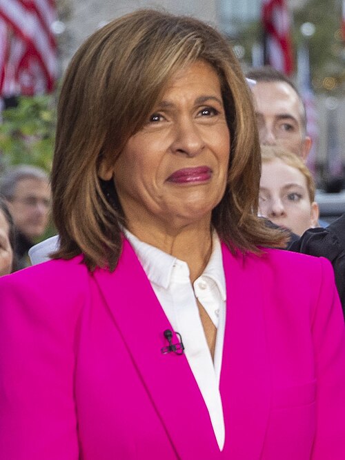Hoda Kotb, left, and Dylan Dreyer film a live broadcast on the set of The Today Show in New York Cit.jpg