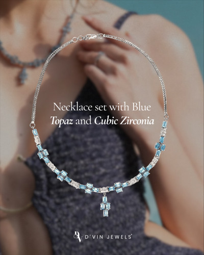 Draped in Blue Topaz, she shines with quiet confidence..jpg