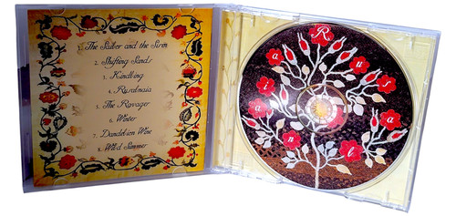Artistic Music CD Case with Floral Design.jpg
