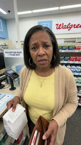 15 aretha pharmacy counter black f ref.jpg