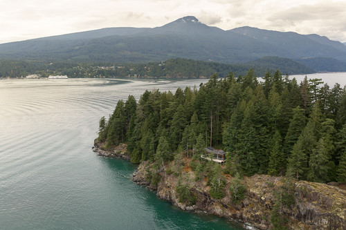 gambier island residence bc aerial wide howe sound mountain backdrop.jpg