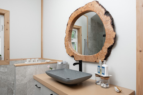gambier island residence bc bathroom live edge mirror stone vessel sink.jpg